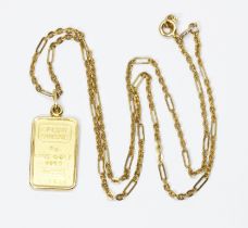 A Credit Suisse 5g 999.9 Fine Gold ingot, on 50cm Italian chain marked '750', gross weight 11.4g.
