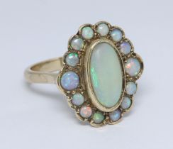 An opal cluster ring, the cluster measuring approximately 19mm x 16mm, hallmarked 9ct gold,