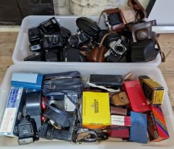 Two boxes of assorted vintage caneras & accessories to include an Ilford sportsman, Praktica, Cannon