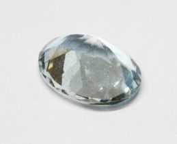 A loose oval mixed cut aquamarine weighing approximately 2 carats.