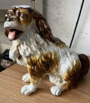 Antique dog figure by Fischer & Mieg, Bohemia (1853-73) with impressed F&M mark, height 20cm