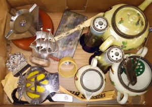 A box of collectables to include a bone Stanhope, silver rimmed items, ashtrays, ornaments, AA