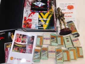 A box of misc. items including cigarette and tea cards, a folder of Rugby League World Cup, 1995,