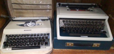 A Mercedes and an Olivetti "Dora" typewriters.