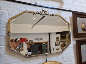 An early 20th century brass framed mirror, 78cm x 55.5cm.