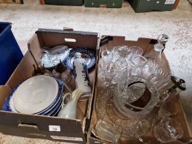 A box of ceramics and a box of glassware.