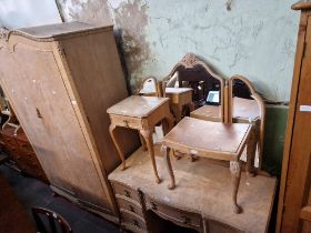 A suite of bur walnut bedroom furniture by Beresford & Hicks comprising wardrobe, dressing table,