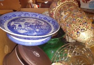 A box of various ceramics & glass items to include blue and white & a brass hand bell etc.