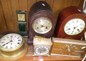 Six clocks including a ship's brass bulk head clock etc.