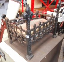 A cast iron fire grate.