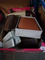 A box of assorted items, personal grooming kits, address books, 2 Parker pens, etc.