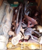 A box of treen / ethnic woodworking items.