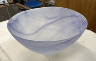 A very large art glass bowl with lilac and white swirl design. Height 19cm, diameter 39cm