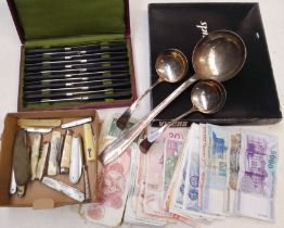 A mixed lot comprising assorted bank notes, silver plated ware and assorted fruit knives.