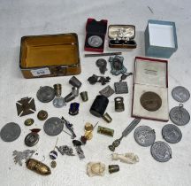 Tin of medallions and thimbles etc.