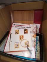 A box of assorted stamp albums including GB and high values