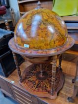 A vintage globe drinks cabinet.