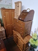 Various items of furniture; a pine wardrobe, a pine dressing table, pine bedside cabinet, oak