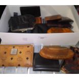 A box of leather purses.