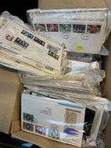 A box of UK first day covers.