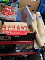 A box containing Arsenal FC memorabilia including books and collectables together with a