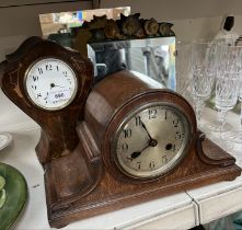 Art Nouveau clock, An Oak cased mantel Clock with key and Pendulum and two mirrors