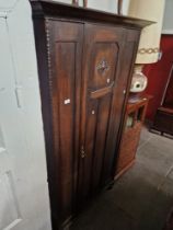 An early 20th century oak wardrobe.