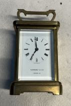 A Gerrard & Co brass carriage clock.