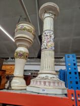 A tall jardiniere together with another.