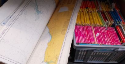 A box of OS maps and a folder of admiralty charts, some for Scotland, some for Cornwall, etc.