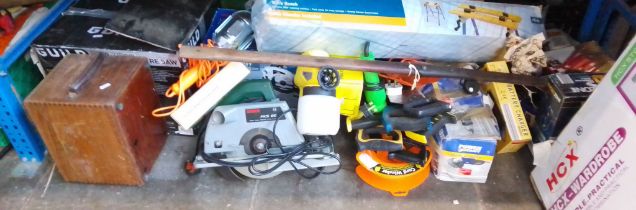 A large quantity of power tools and garage equipment, two storage wardrobes, a fabric shelving /