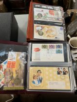 Six stamp albums containing first day covers together with two postcard albums and some