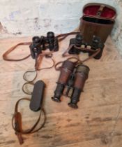 A pair of WW1 Lemaire Fabt Paris binoculars together with a Voigtlander Dienstglas 6x30 and a
