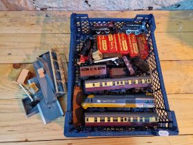 A box of various model railway items including Triang Hornby, locos, rolling stock, buildings, etc.