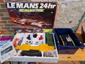 A Le Mans 24hr Scalxtric set & a box containing 2 Scalextric cars & track
