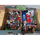 Two boxes of assorted diecast vehicles to include Matchbox, Hotwheels & Dinky etc.