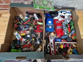 Two boxes of assorted diecast vehicles to include Matchbox, Hotwheels & Dinky etc.