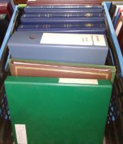 A box of assorted albums including QEII coin covers, postcards, RAF FDCs etc.