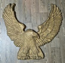 An original prop from the Peter Kay series 'Phoenix Nights', gold phoenix plaque, 115cm X 107cm,
