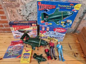 A box of assorted Thunderbirds & Captain Scarlet toys.