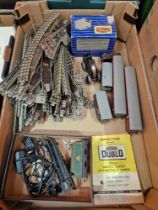 A box of assorted model railway items including track, carriages and a loco (as found).