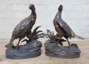 Jules Moigniez (French, 1835-1894), a pair of gilt bronze pheasants on naturalistically formed