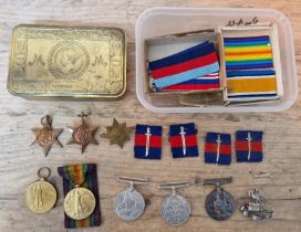 A WW1 Liverpool Pals silver cap badge, marked E&C, London, 1914 together with a collection of medals