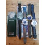 A group of five Swatch watches including an automatic and an Irony.