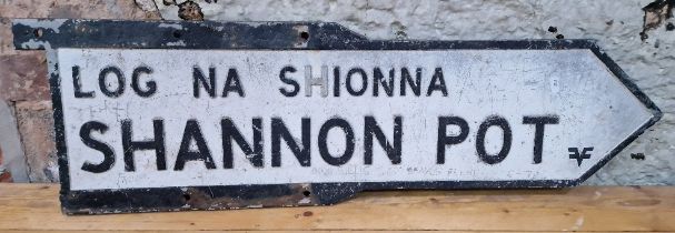 A metal road sign for 'SHANNON POT' in Ireland.