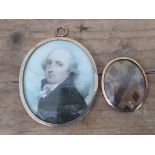 An early 19th century miniature portrait, yellow metal oval frame, 5.5cm x 6.5cm, together with some