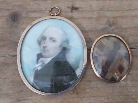 An early 19th century miniature portrait, yellow metal oval frame, 5.5cm x 6.5cm, together with some