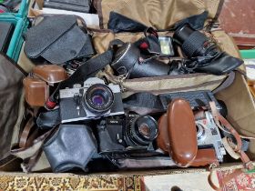 A box of assorted cameras & accessories to include a Kodak ColorSnap 35, Petri GX-1....