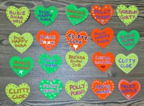 A group of original props from the Peter Kay series 'Phoenix Nights', fluorescent badges from ladies