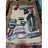 A box of assorted 00 gauge model railway items to include 4 locos and rolling stock.